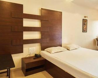 Hotel Krushna Inn - Trimbak - Bedroom