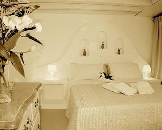 Mariakis Luxury Studios - Astypálaia - Ložnice