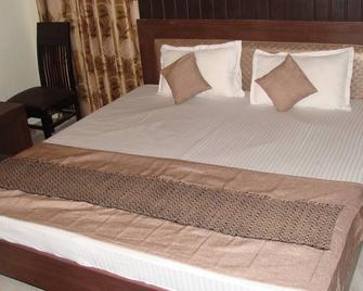 Hotel Abhinandan Grand - Dehradun - Bedroom