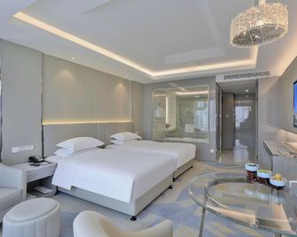Fuyue Hotel - Jiaxing - Bedroom