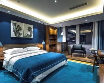 Yunyi Art Hotel - Rizhao - Ložnice