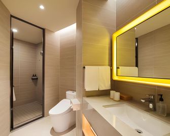 Ji Hotel Harbin Songbei Wanda Hotel - Harbin - Living room