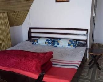 Hardik Resort - Chaukori - Bedroom