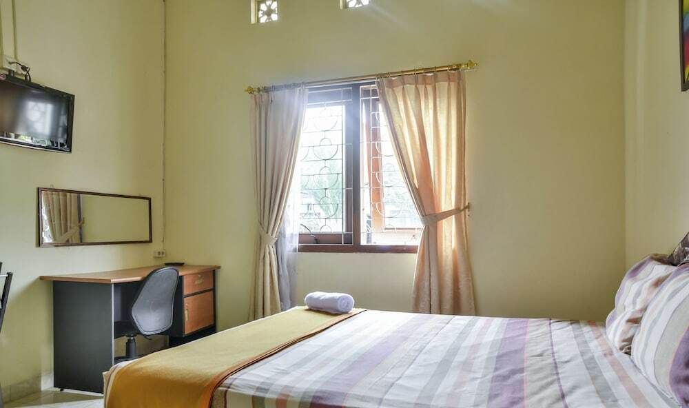 Zen Rooms Depok Sleman Syariah - יוגיאקרטה - חדר שינה