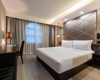 Orange Hotel Qingdao The Mixc - Qingdao - Bedroom