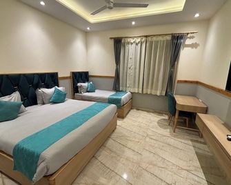 The Cocoon - Boutique Stay and Party Lawn Dehradun - Dehradun - Bedroom