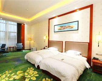 Shuangcheng Hotel - Turpan - Bedroom