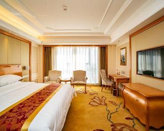 Jiayuguan Tiancheng International Hotel - Джіаюгуан - Спальня