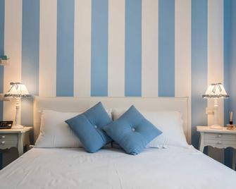 لاس سويتس مايوليا - أولبيا - غرفة نوم