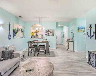 Condo at Barefoot Golf Resort with Shuttle to Beach! - Myrtle Beach - Living room