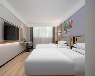 City Comfort Inn Nanchong Five Star Garden - Nanchong - Schlafzimmer