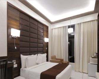 Hotel Silver Heights - Ahmedabad - Habitación