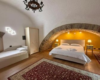 Hotel Lieto Soggiorno - אסיסי - חדר שינה