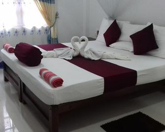 Gorilla African Guest House - Entebbe - Makuuhuone