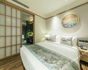 Fujian Enze Xiaozhu Hotel - פוז'ו - חדר שינה