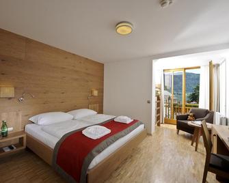 Hotel Urbani am Ossiacher See - Sankt Urban - Bedroom