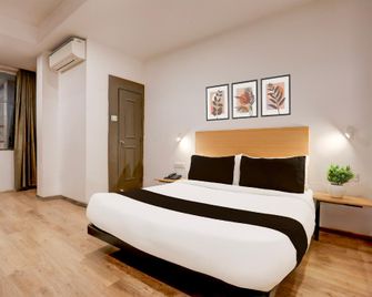 Super Townhouse Kalmana - Nagpur - Schlafzimmer
