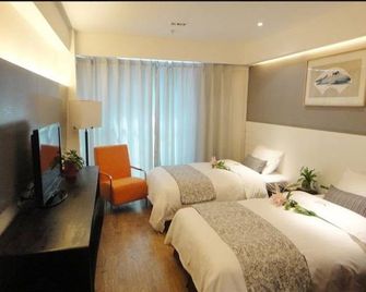 Tianjin Juchuan Lily Hotel - Tianjin - Bedroom