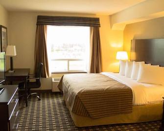 Sigma Inn & Suites - Melville - Bedroom