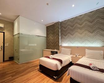 Grand Singgie Hotel - Tanjung Balai - Bedroom