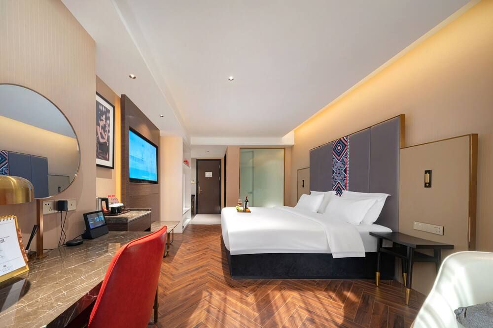 Zhangjiajie Metropolo Hotel - ג'אנגג'יאיי - חדר שינה