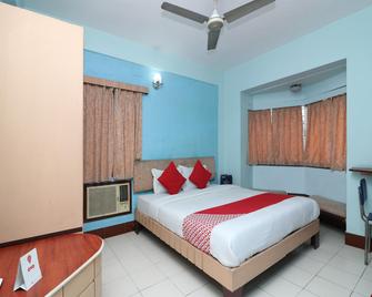 Collection O 5043 Ratnakar Days' Inn - Kolkata - Bedroom