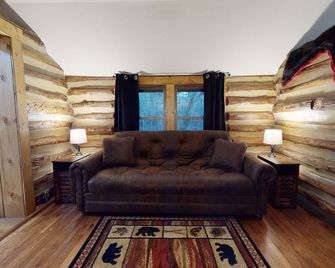 Cozy Log Cabin in the Heart of Smoke Hole Canyon Overlooking South Branch River. - Upper Tract - Living room