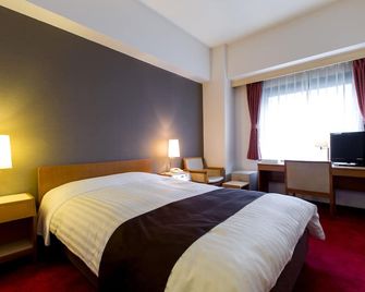 هوتل نيو ستار إكيبوكورو - طوكيو - غرفة نوم