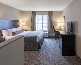 Cobblestone Inn & Suites - Durand - Durand - Camera da letto