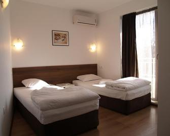 Mikado Hotel - Boergas - Slaapkamer