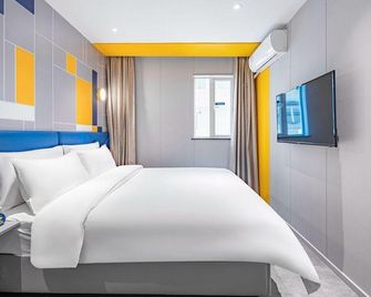7Days Inn Changsha Wuyi Avenue Yunajialing Metro Station - Changsha - Sypialnia