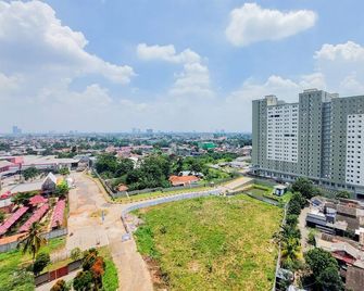 Warm and Simply Studio Room at Urbantown Serpong Apartment By Travelio - South Tangerang City - Outdoor view