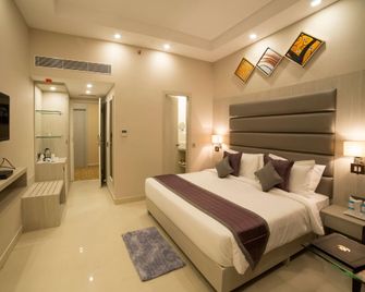 Golden Tulip Salt Lake City Kolkata - Calcutta - Slaapkamer