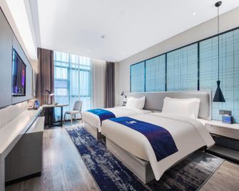 Echarm Hotel Zhongxiang Mochou Lake - Jingmen - Ložnice