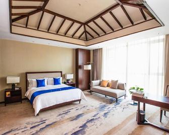 Panjin Honghai Hot Spring Hotel - Panjin - Schlafzimmer