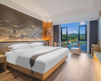 Maitreya Sanlong Hotel (Huquan Hot Spring Ecological Park Honghe Water Town Branch) - Yuxi - Habitación