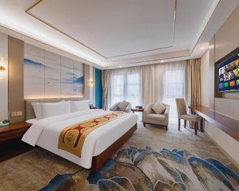 Guoman Apartment Hotel - שנג'ן - חדר שינה