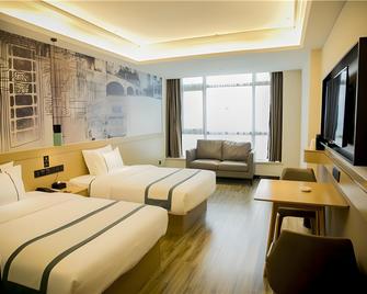 City Comfort Inn Wanning Wan'An Avenue High Speed Railway Station - Wanning - Bedroom