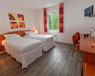 Hotel Restaurant Le Tulipier - Cransac - Slaapkamer