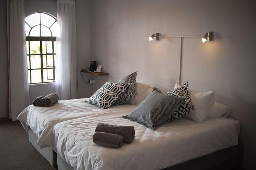 Sweet Thorn Retreat Airport Lodge - Voigtland - חדר שינה