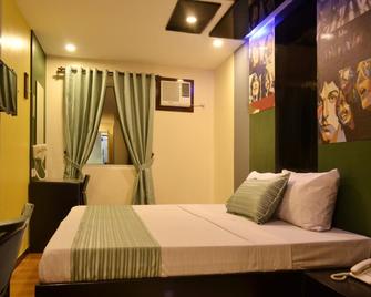 Icon Timog Hotel - Manila - Bedroom