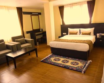 Bhumzang Hotel & Banquet - Gangtok - Habitación