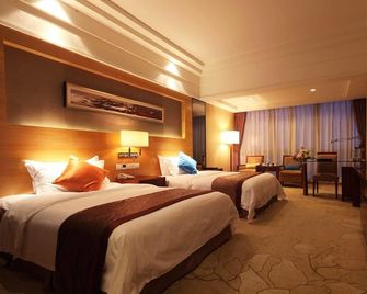 Century Sunshine Hotel Emeishan - Leshan - Camera da letto