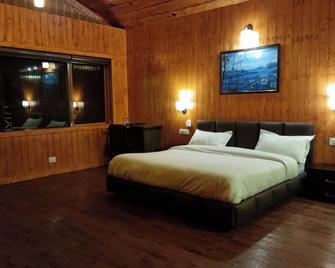Jai Anjana Resort - Kanatal - Bedroom