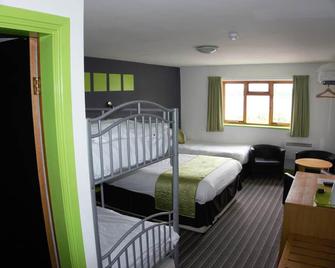 Happy Guests Lodge - Warrington - Schlafzimmer