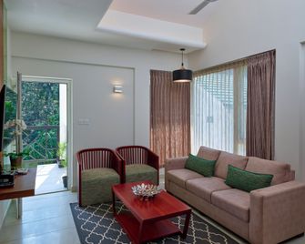 The Woods Resorts Wayanad - Koleri - Huiskamer