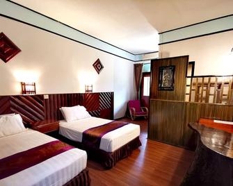 Sepilok Jungle Resort - Sandakan - Camera da letto