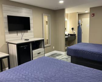 Clairmont Inn & Suites - Houma - Slaapkamer