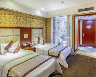 Yihai International Business Hotel - Zhangjiakou - Bedroom