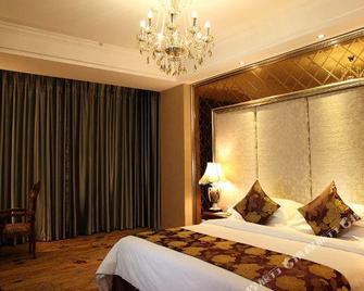 Four Seasons Moon Hotel - Liangshan - Bedroom